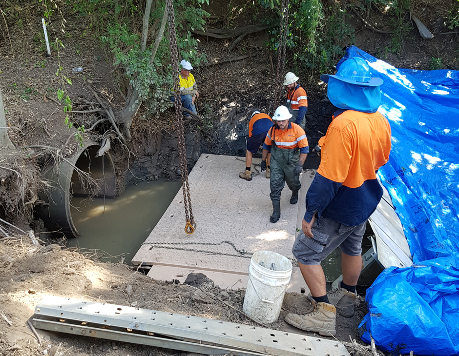 Staging Mats on Muddy Drain Entrance
